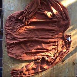 Orange pheasant blouse.